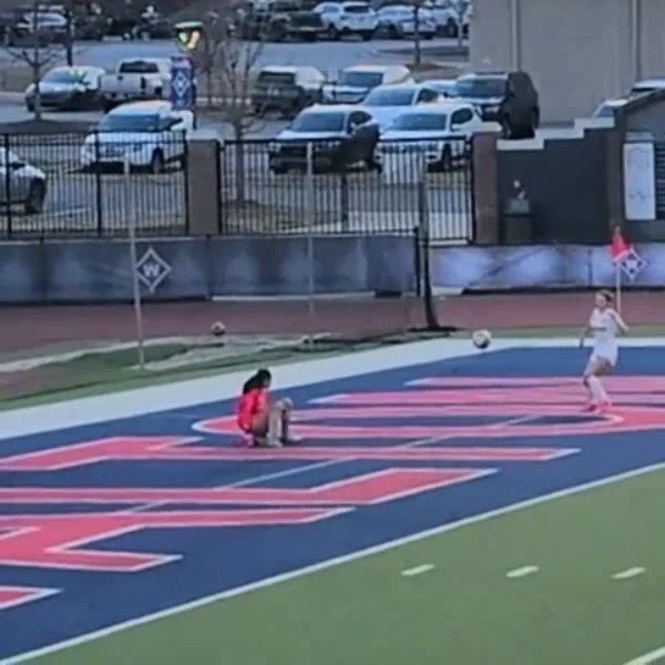 Aviana Owings making a diving save for Walton