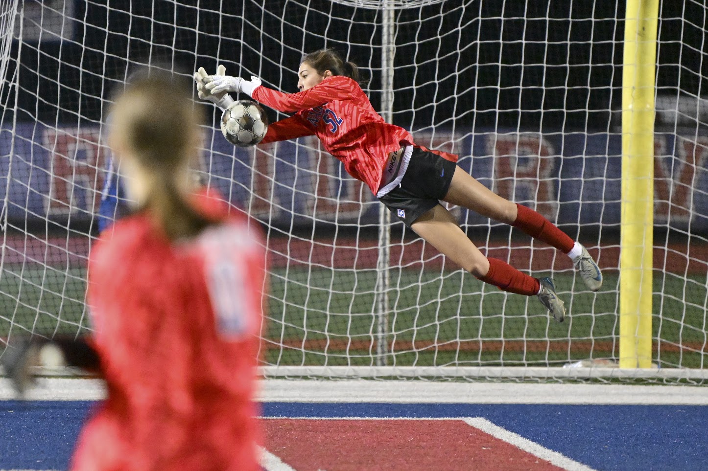 Aviana Owings diving to make a save, Walton vs. Hillgrove 2026